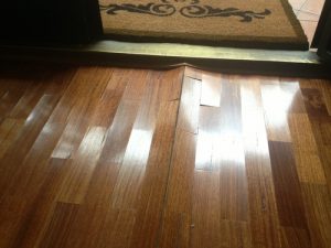 Wood Floor Drying - example of cupped floorboards.